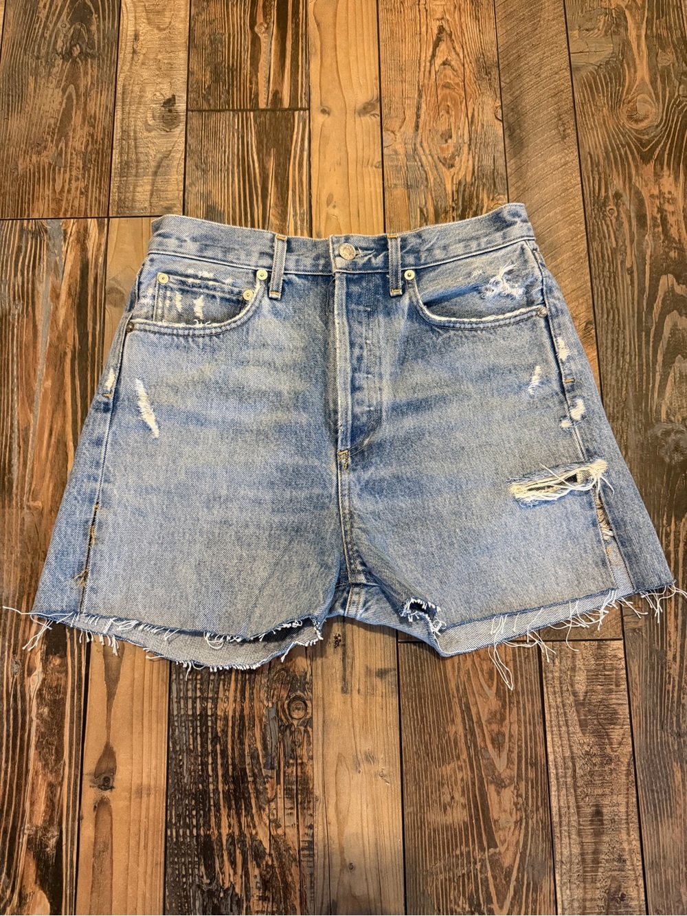 Agolde Light Blue Distressed Denim Cutoff Shorts
